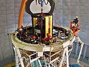 The DECam prime focus cage is mounted in the top ring of the Blanco 4-m telescope