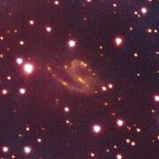 Galaxia de fondo en una imagen del Remanente de Supernova Vela