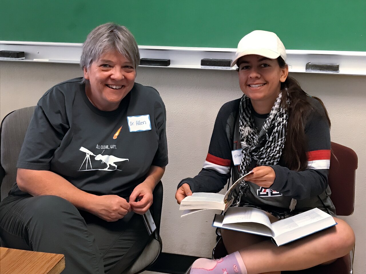 NOIRLab’s Dr Lori Allen (left), Associate Director of Kitt Peak Observatory, giving up some of her time to work with high-school students at a Teen Astronomy Café