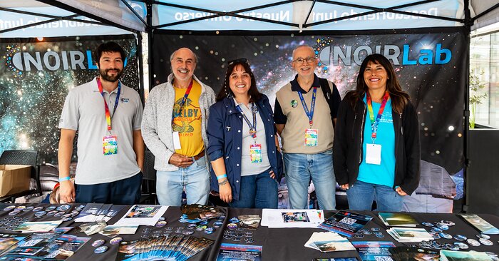 Staff at the NOIRLab booth at AstroDay Chile 2024.