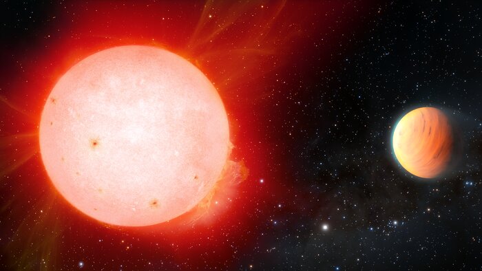 Impresión artística del planeta gaseoso ultra esponjoso orbitando una estrella enana roja
