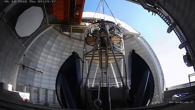 Removing the old camera for the Mayall 4-meter telescope.
